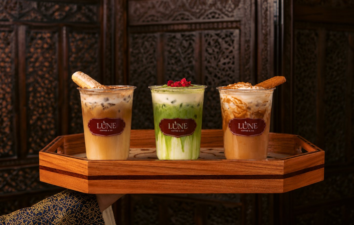 Three Lune signature drinks on a tray